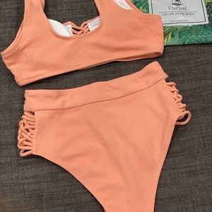 Brand new pink two piece swimsuit